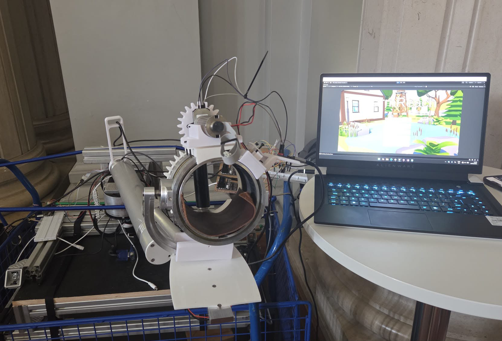 Home rehabilitation robot wrist module alongside its Unity rehabilitation game